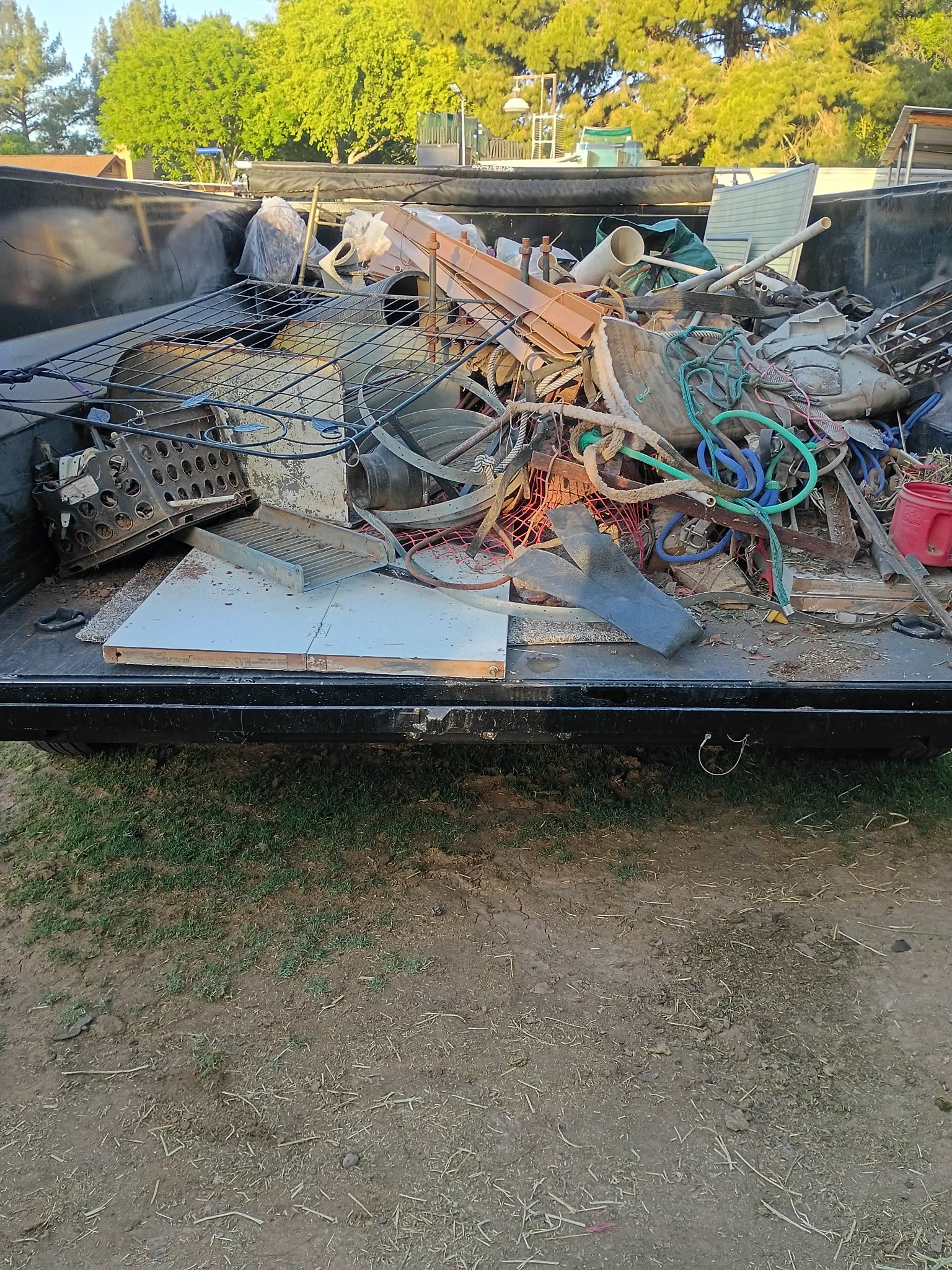 Trailer loaded with debris